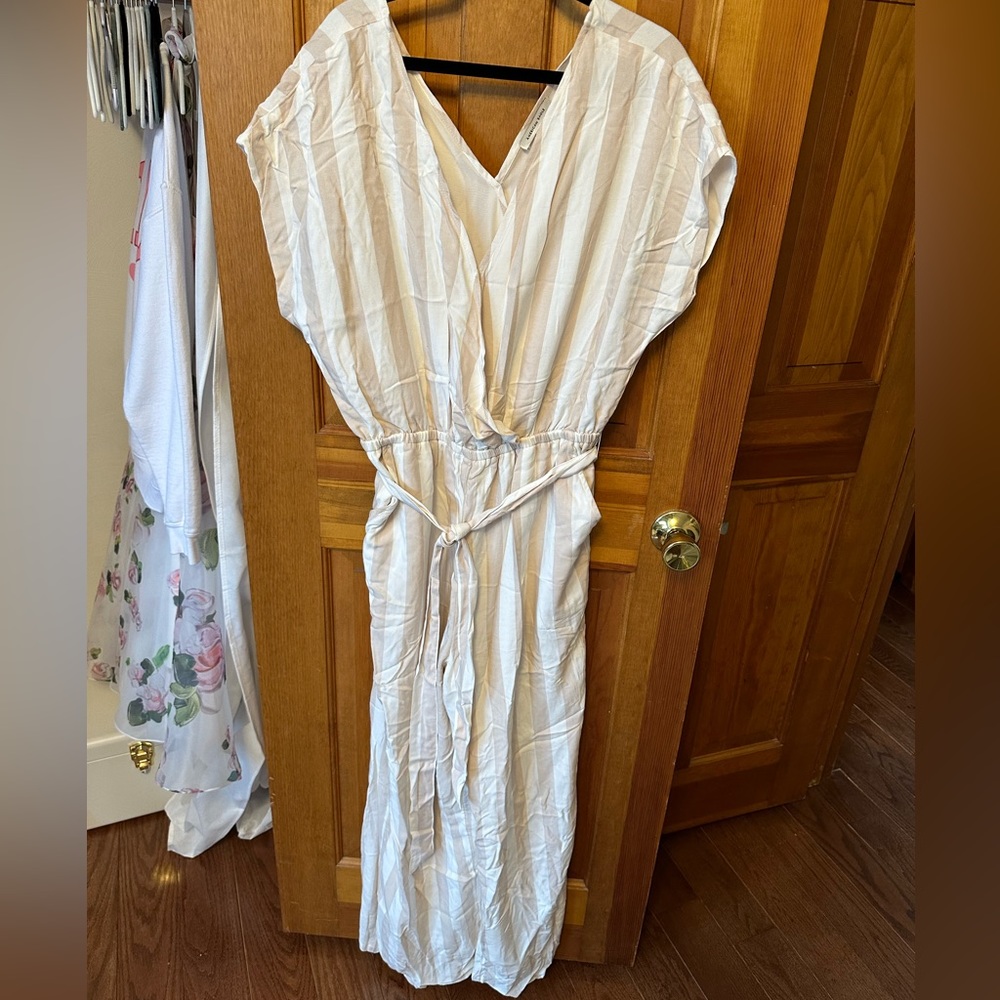 Stripped American eagle jumpsuit with tie in front. Worn once